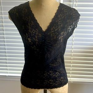 Women’s sleeveless lace top with touched front.